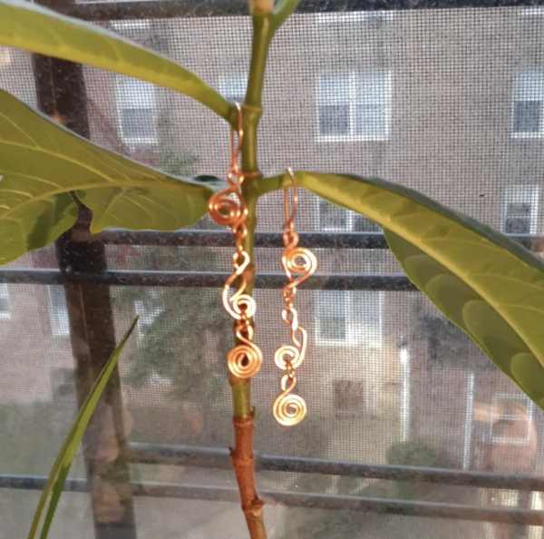 Long hanging gold earrings